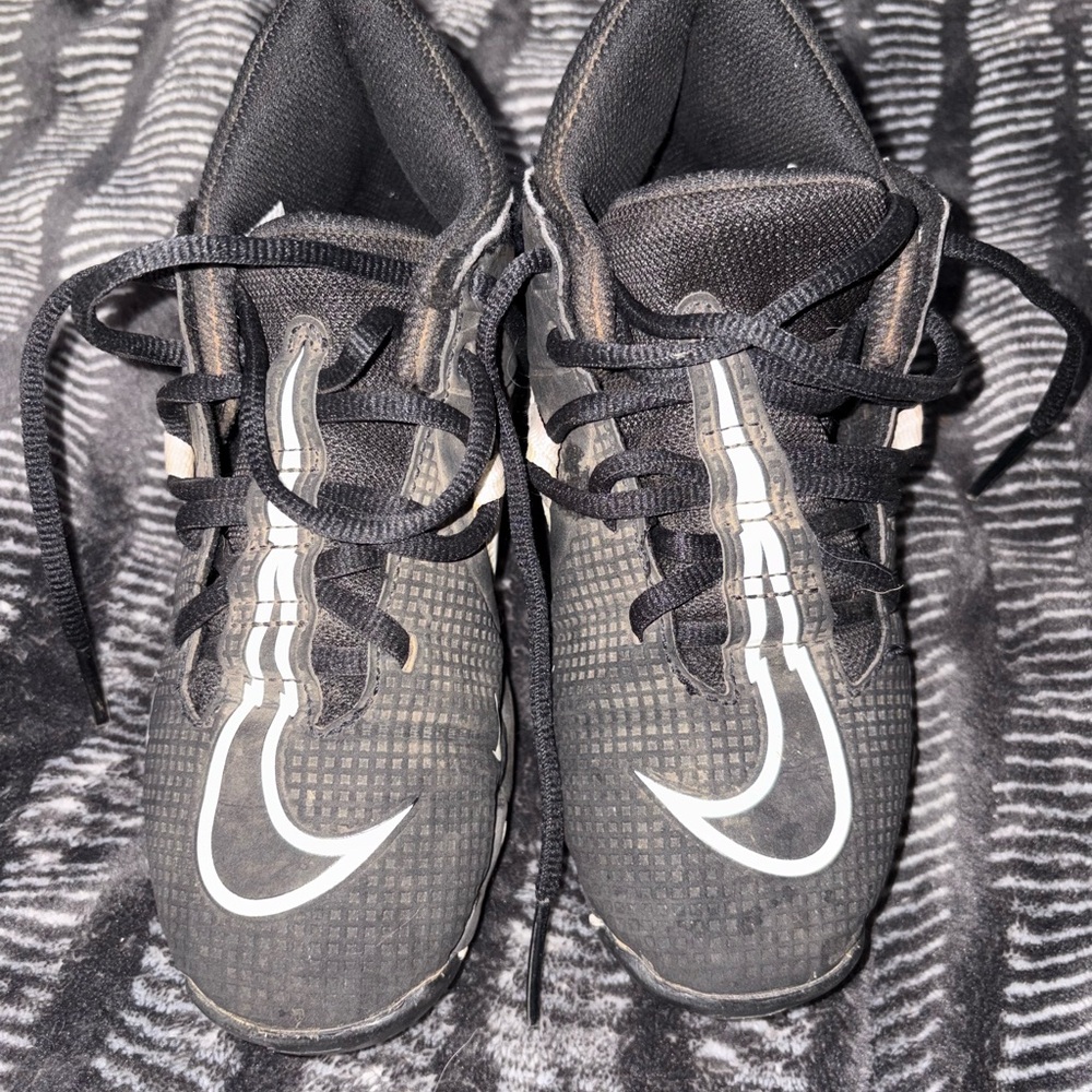 Nike Kids' Black Cleats with White Swoosh